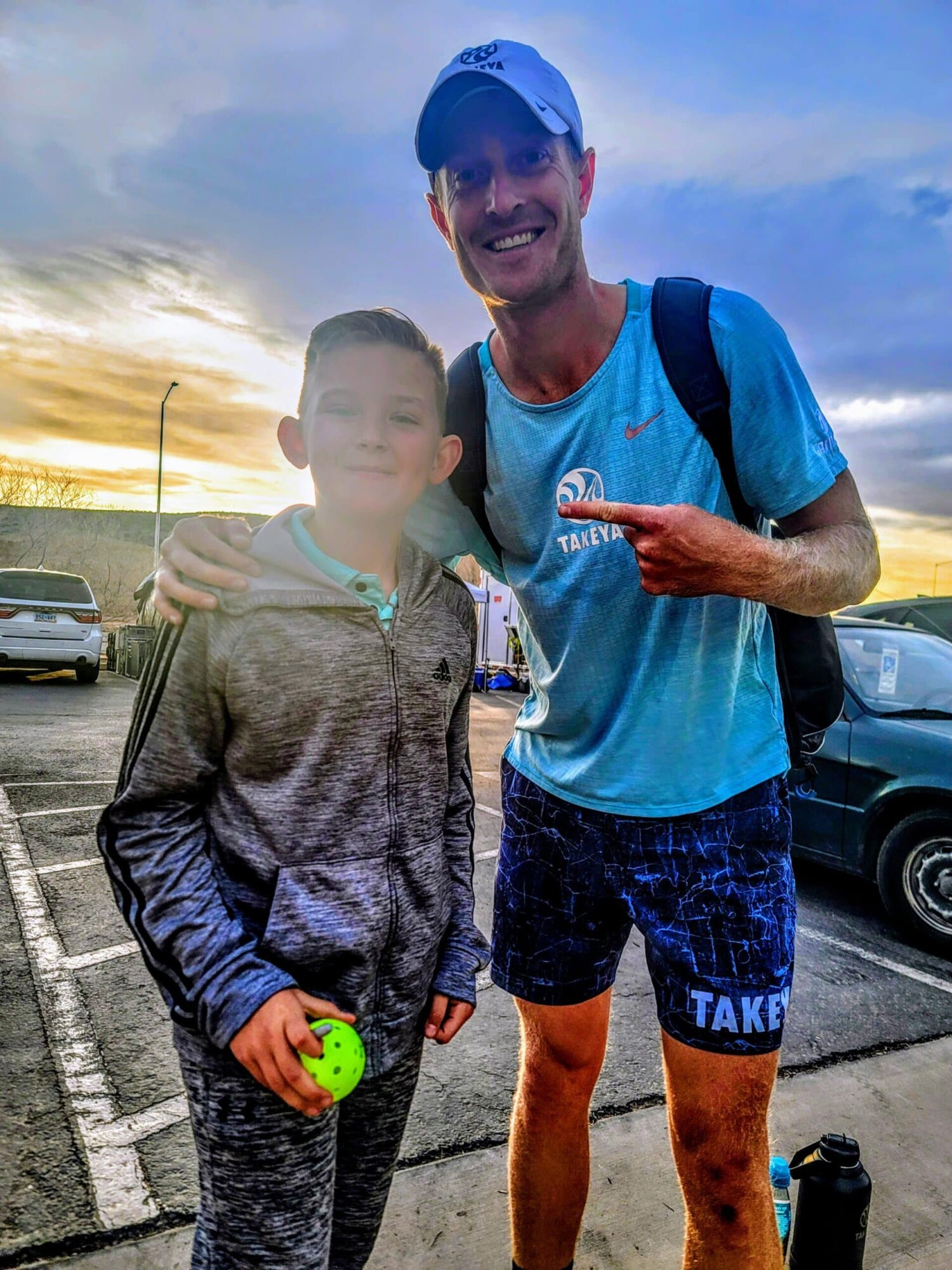 Jett met his hero, Pickleball legend Riley Newman who signed a pickleball and took a pic