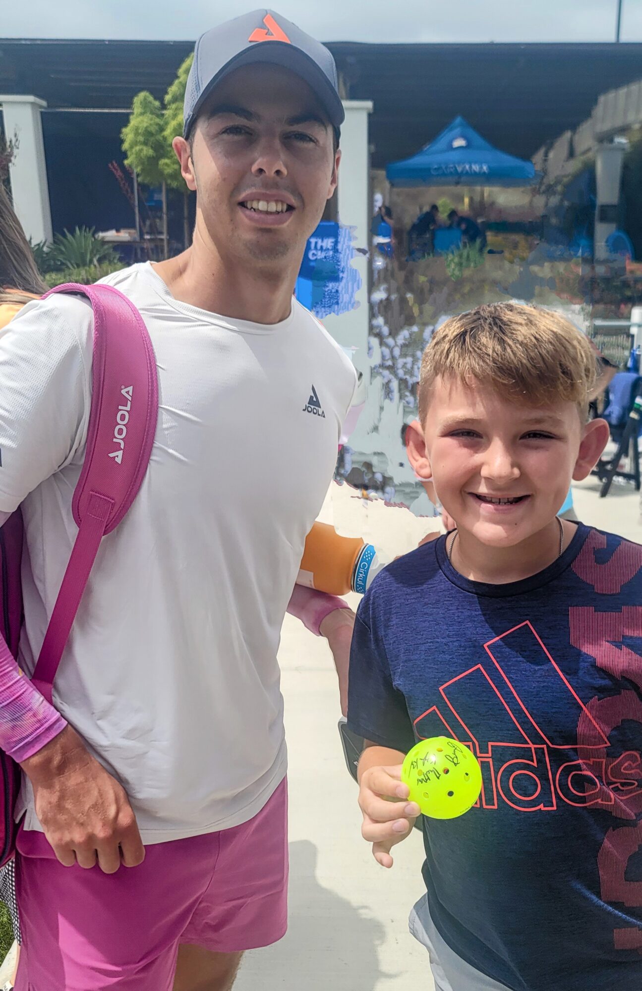 We met the #1 Mens pickleball player in the world, Ben Johns, who signed a ball and took a picture with Jett